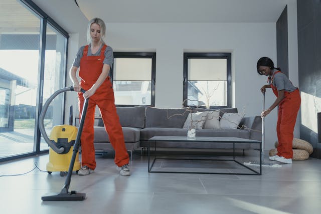 Cleanerscleaning a house in Ashford – professional home cleaning service